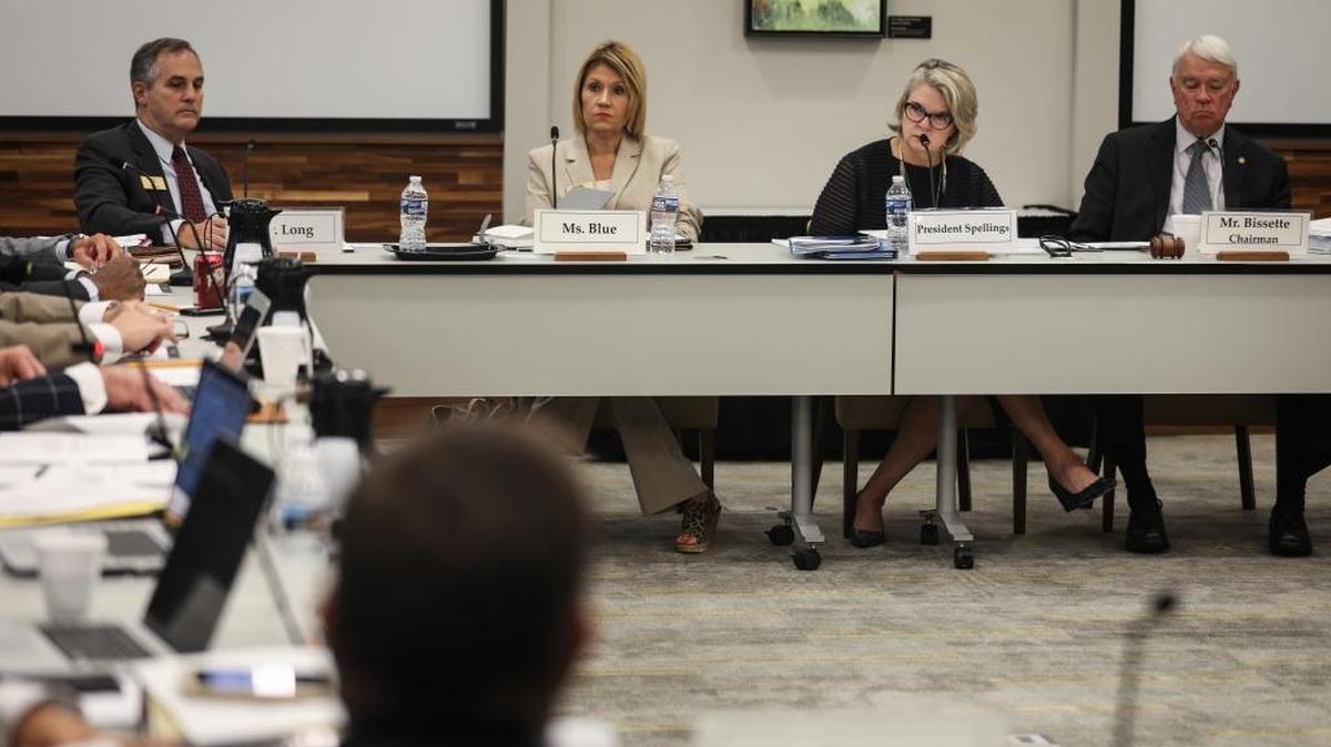 UNC System President Margaret Spellings, left, and UNC Board of Governors Chairman Louis Bissette, listen to board member Tom Fetzer propose a resolution to reduce tuition and fees. during a meeting held Thursday, Sept. 7, 2017 in Chapel Hill.