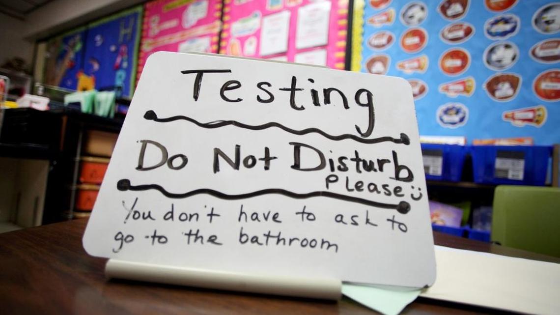 This sign sits on the desk of third grade teacher Sara Ancira on Tuesday, April 29, 2014, in Naperville, Illinois.