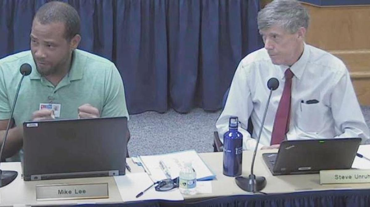 School board Chairman Mike Lee and School board member Unruhe listen during the board’s discussion last week about zero-based budgeting.