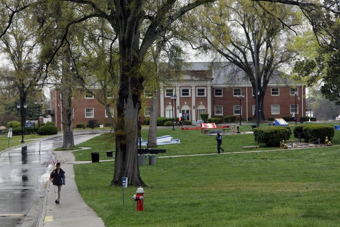 People walk across the main courtyard on the campus of St. Augustine’s University in Raleigh.