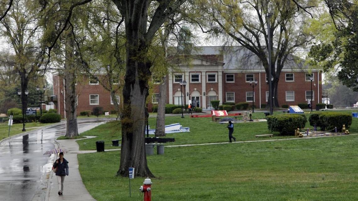 People walk across the main courtyard on the campus of St. Augustine’s University in Raleigh.