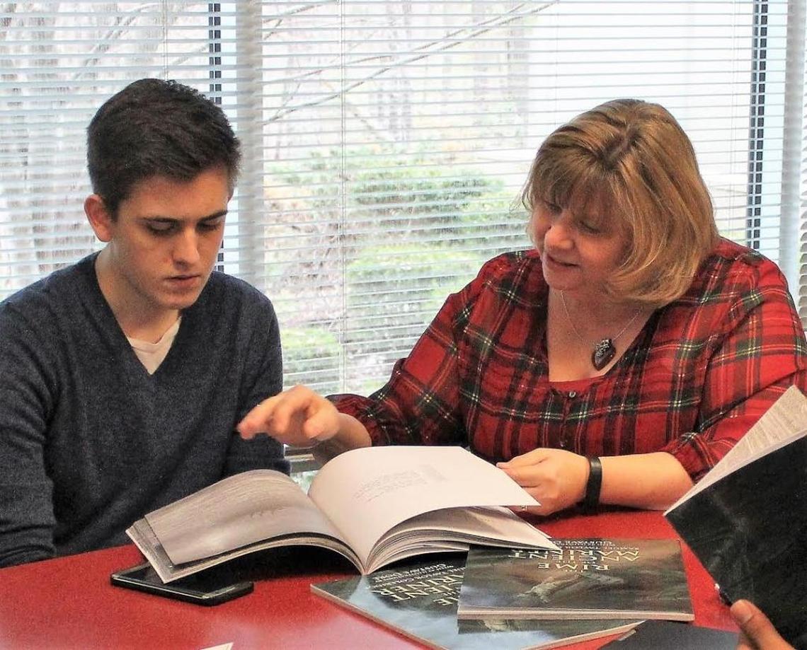 Deborah Brown is seen here working with one of her students at Research Triangle High School when she was North Carolina Charter School Teacher of the Year in 2017.