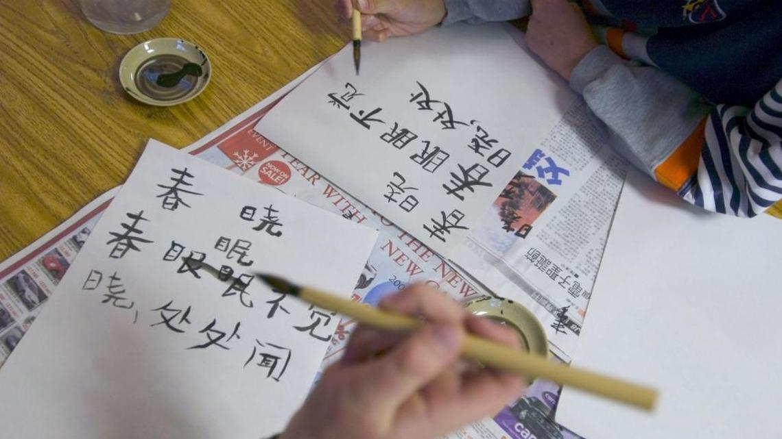 Students learn Chinese calligraphy in this file photo taken at Glenwood Elementary School in Chapel Hill.