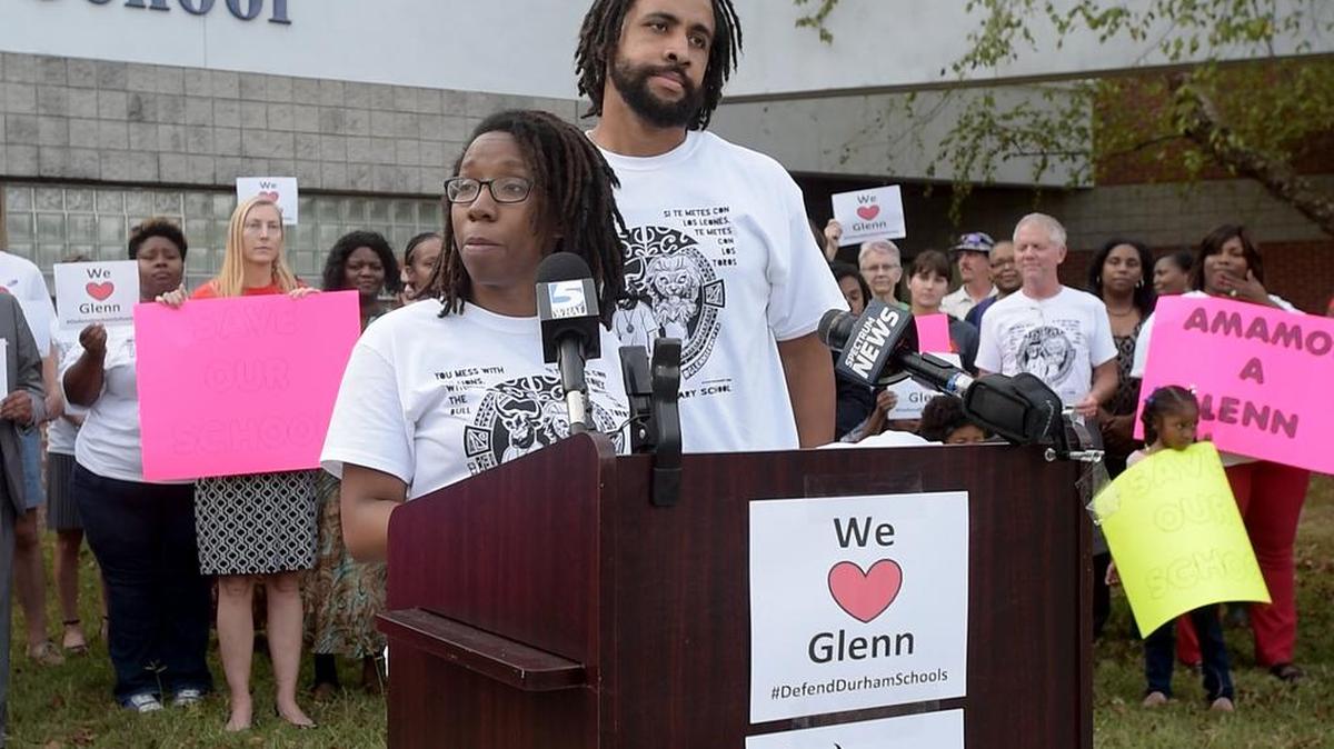 David Vanie looks on as his wife, Tamara, speaks out against a then-potential state takeover at Glenn Elementary School on Oct. 10, 2017.