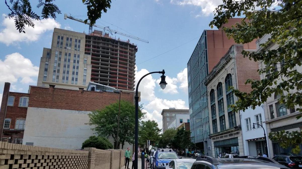East Main Street in downtown Durham. One City Center is the tall building under construction.