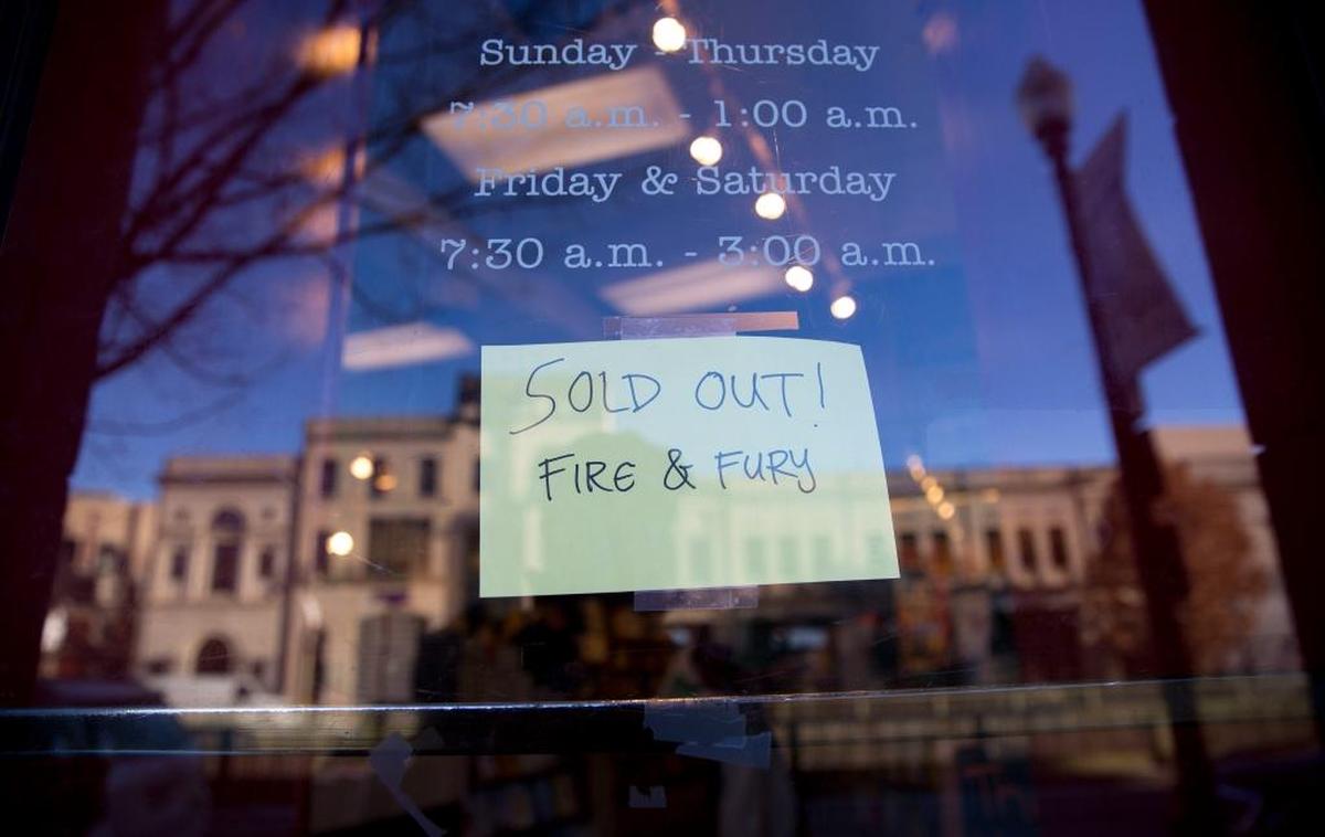 A sign posted ot the door for Kramerbooks & Afterwords Cafe in Washington, D.C., indicating that the book “Fire and Fury: Inside the Trump White House” is sold out at the bookstore Friday, Jan. 5, 2018.