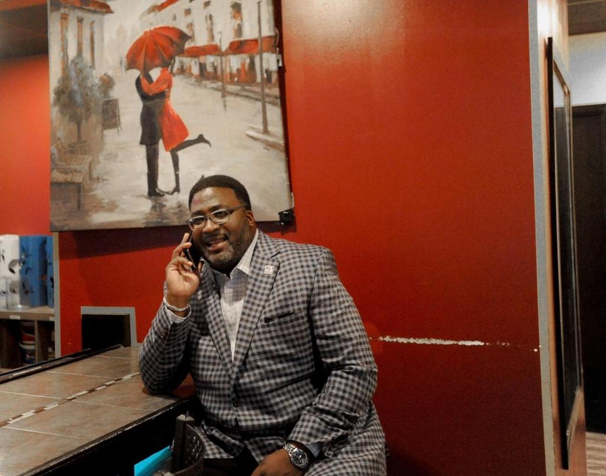 Farad Ali on the phone during the 2017 primary election results party on Tuesday, Oct. 10, 2017.