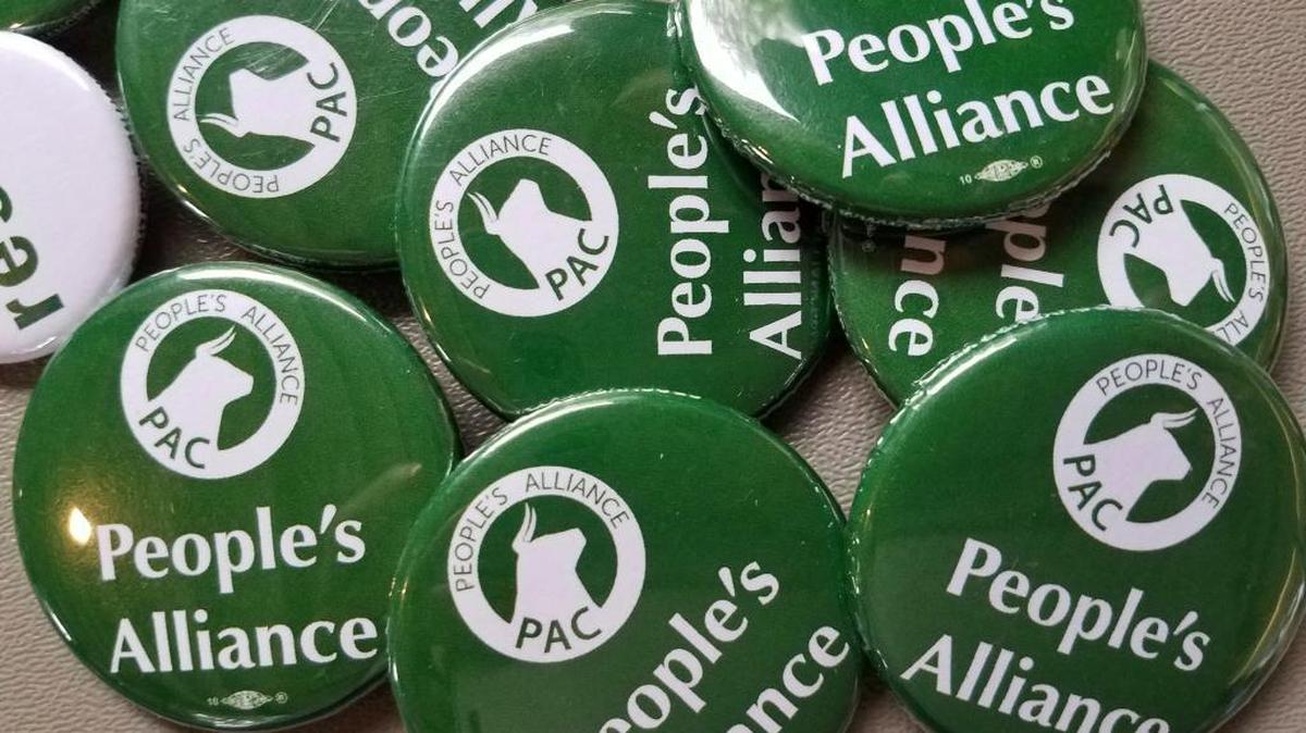 People’s Alliance buttons photographed during its 2017 Durham municipal election endorsement meeting.