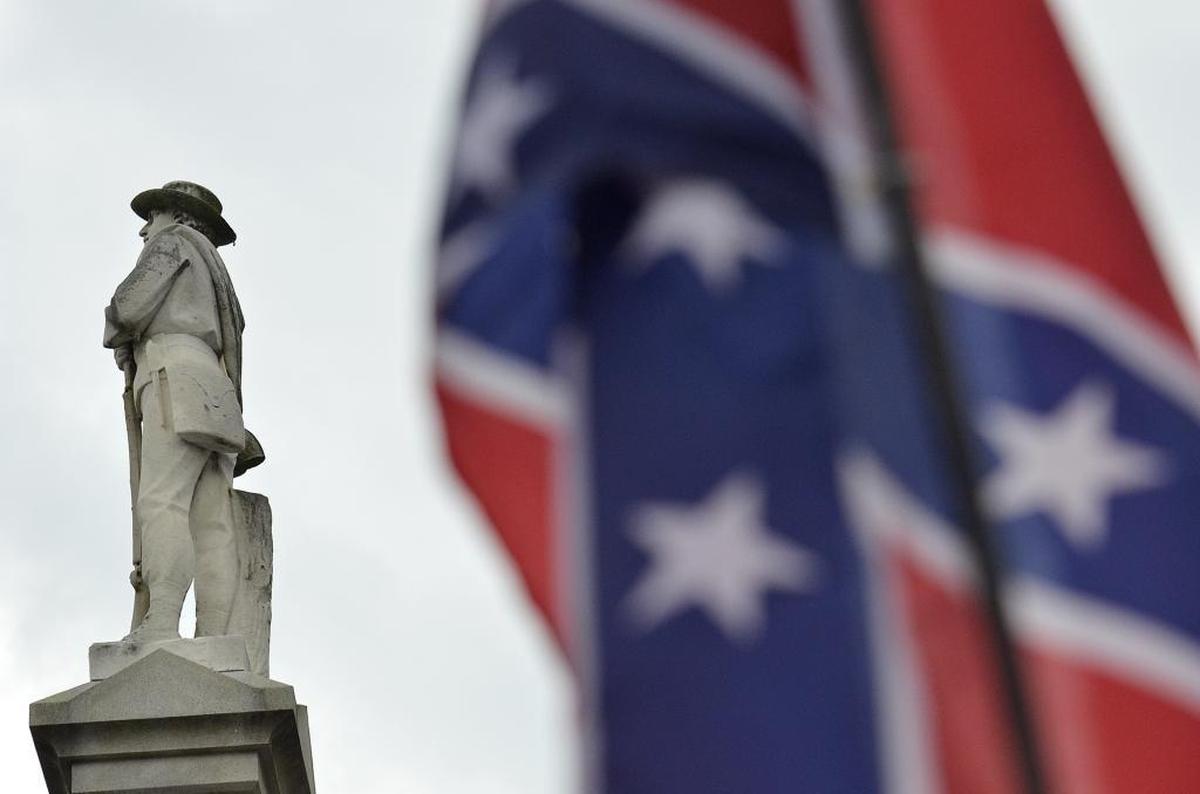 A woman whose ancestors fought for the Confederacy has sued the Gaston County commissioners’ chairman over a vote by commissioners to move a Confederate soldier statue from outside the Gaston County Courthouse in Gastonia.