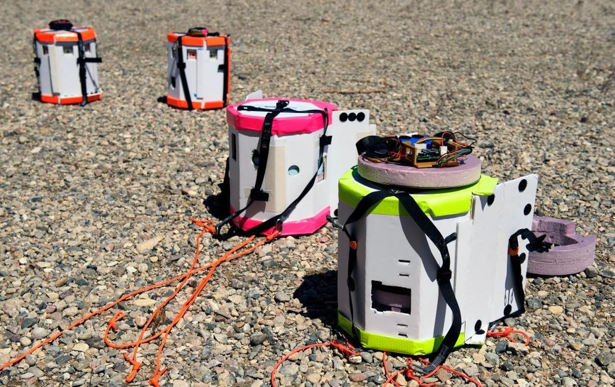 Payload housings containing video, still photo and tracking systems are arranged before a test launch of a high-altitude balloon Wednesday, June 22, 2017 in Rexburg, Idaho. MSU photo by Kelly Gorham