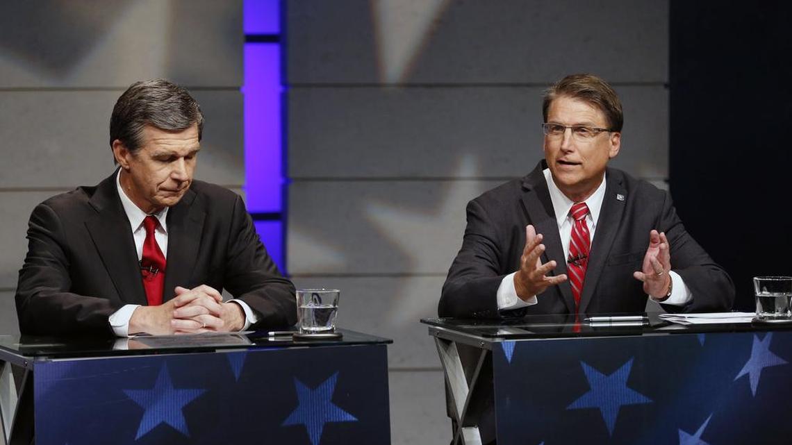 Candidates for Governor of North Carolina Roy Cooper (D), left, and Gov. Pat McCrory (R) debate at WRAL studios in Raleigh on Oct. 18, 2016. Both McCrory and Cooper have had ‘dark money’ groups support their agendas.