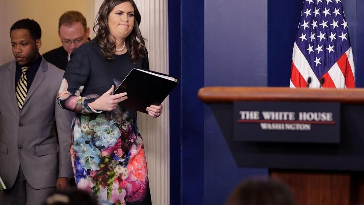 White House Press Secretary Sarah Huckabee Sanders takes the podium for a news conference in the Brady Press Briefing Room at the White House November 17, 2017 in Washington, DC. Huckabee fielded questions about sexual harassment allegations against Judge Roy Moore, Sen. Al Franken and President Donald Trump.