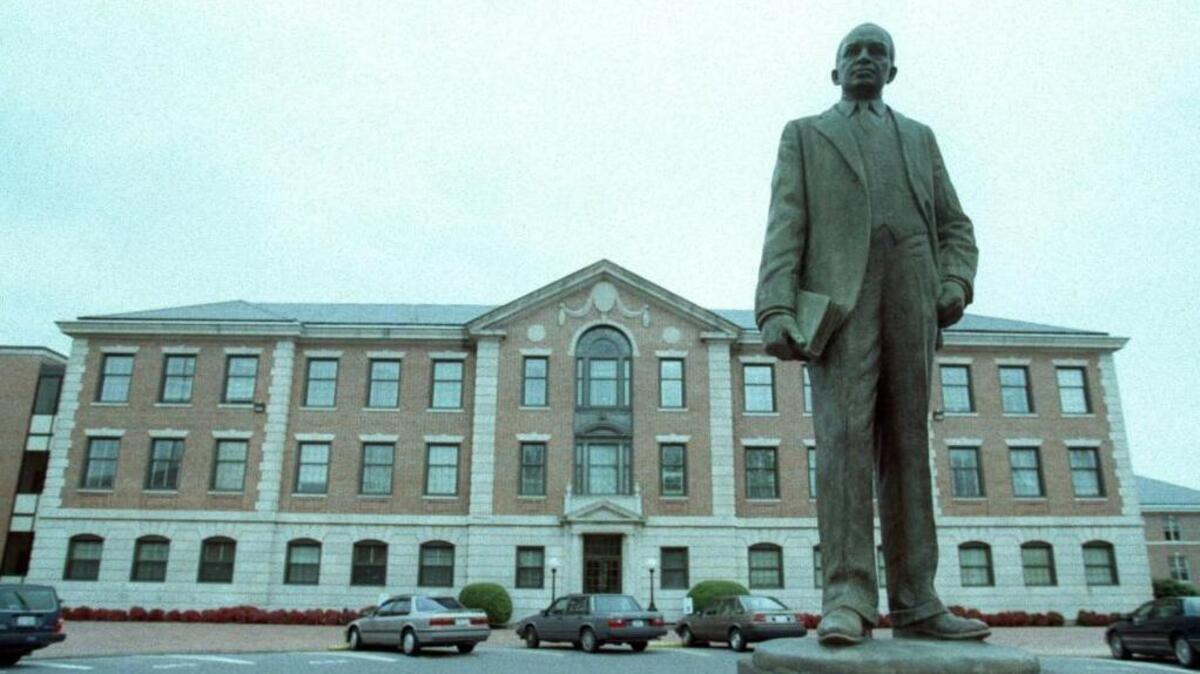 The Hoey Administration Building on the N.C. Central University campus sits behind a statue of James Shepard, founder and president of North Carolina College at Durham from 1910 to 1947.