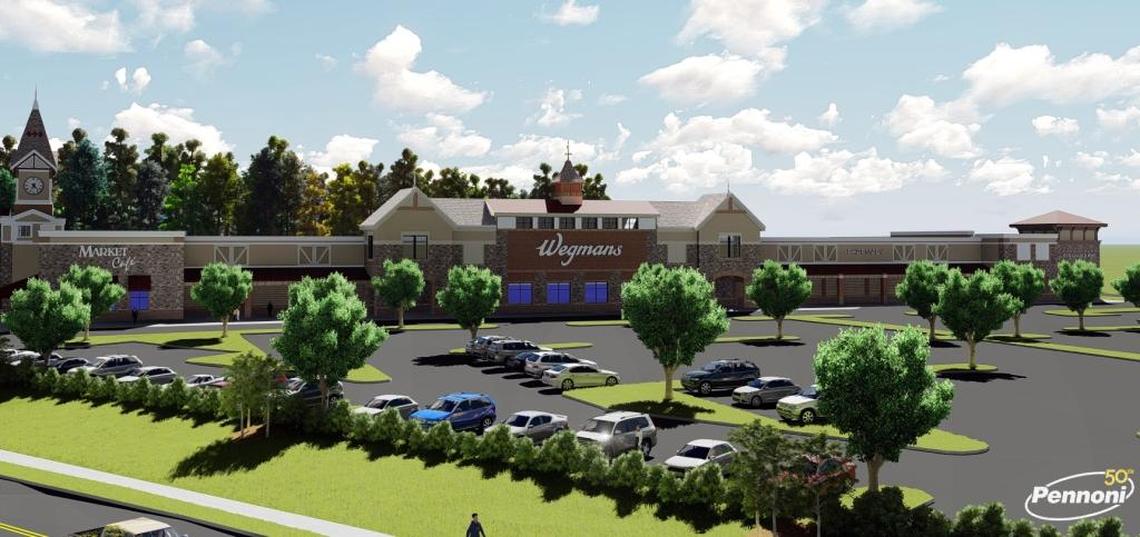 An artist’s rendering shows Wegmans Food Market as it would be seen from U.S. 15-501 near the Hardee’s restaurant on Old Durham Road in Chapel Hill. The Town Council could vote on the proposed 130,000-square-foot store in October.