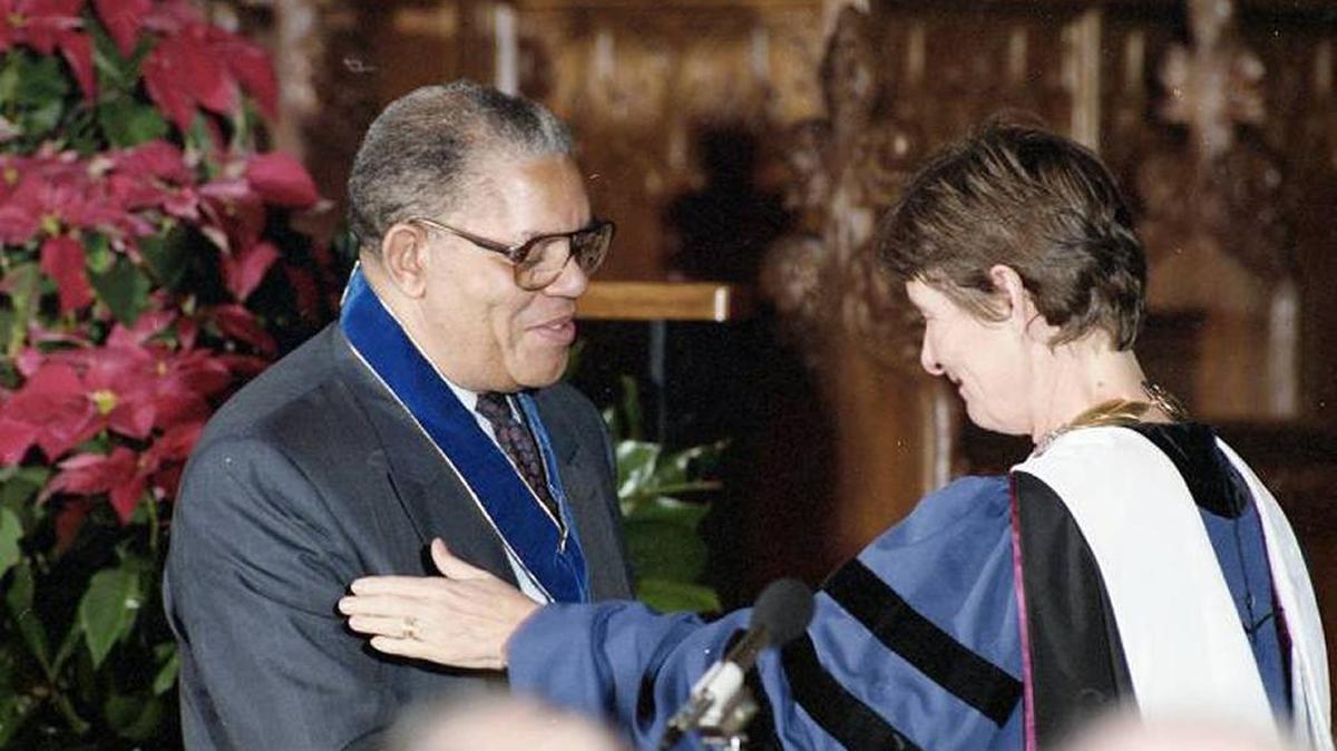 Samuel DuBois Cook receives Duke’s University Medal from then-president Nannerl O. Keohane in 1993.