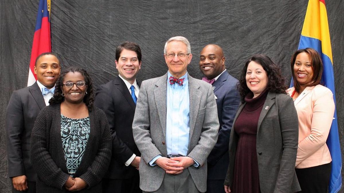 Reader Sam Bryan wanted to know whether the Durham City Council intended to single Israel out in a statement condemning military-style police training. So he asked Mayor Steve Schewel (center).