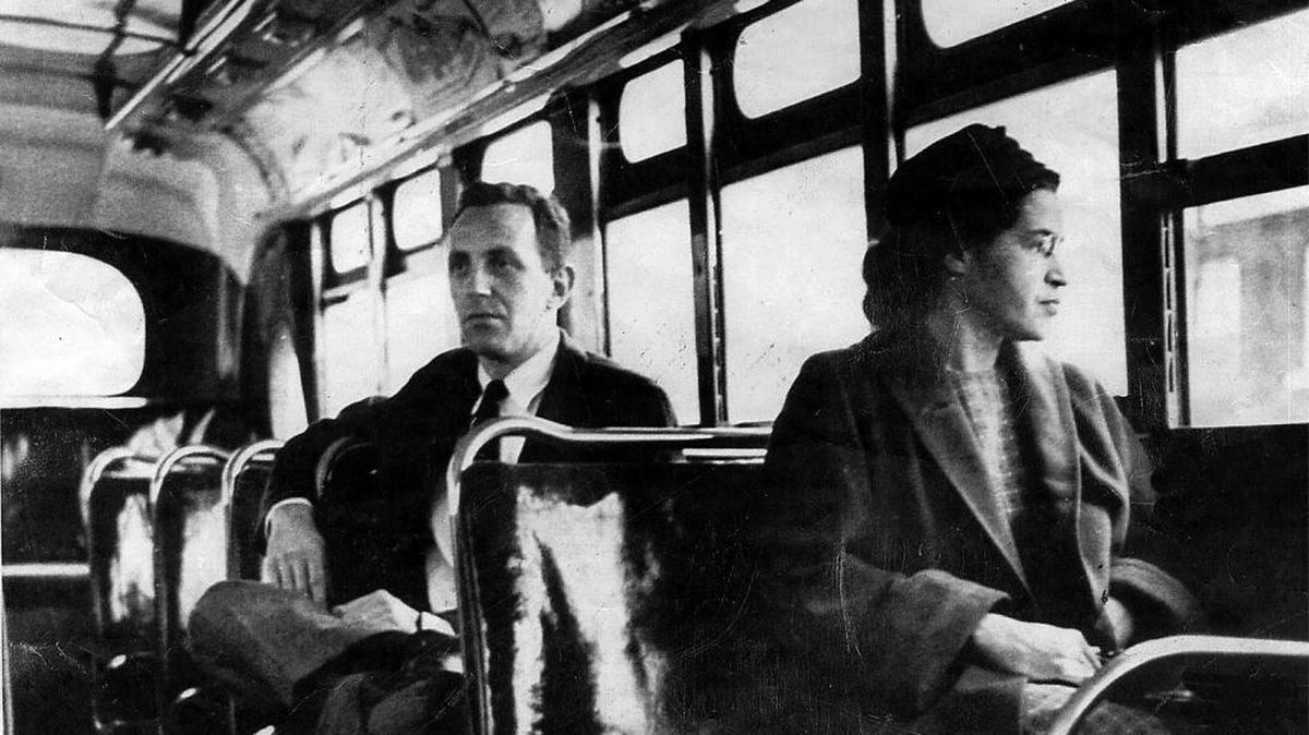 This an undated photo shows Rosa Parks riding on the Montgomery Area Transit System bus. Parks refused to give up her seat on a Montgomery bus on Dec. 1, 1955, and ignited the boycott that led to a federal court ruling against segregation in public transportation.