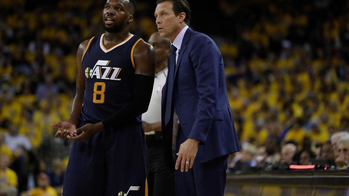 Utah Jazz head coach Quin Snyder talks to guard Shelvin Mack (8) during the first half in Game 2 of an NBA basketball second-round playoff series against the Golden State Warriors, Thursday, May 4, 2017, in Oakland, Calif. (AP Photo/Marcio Jose Sanchez)