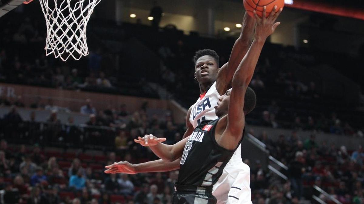 Team USA’s Mohamed Bamba blocks a shot by World Select Team’s R.J. Barrett during the Nike Hoop Summit in April.