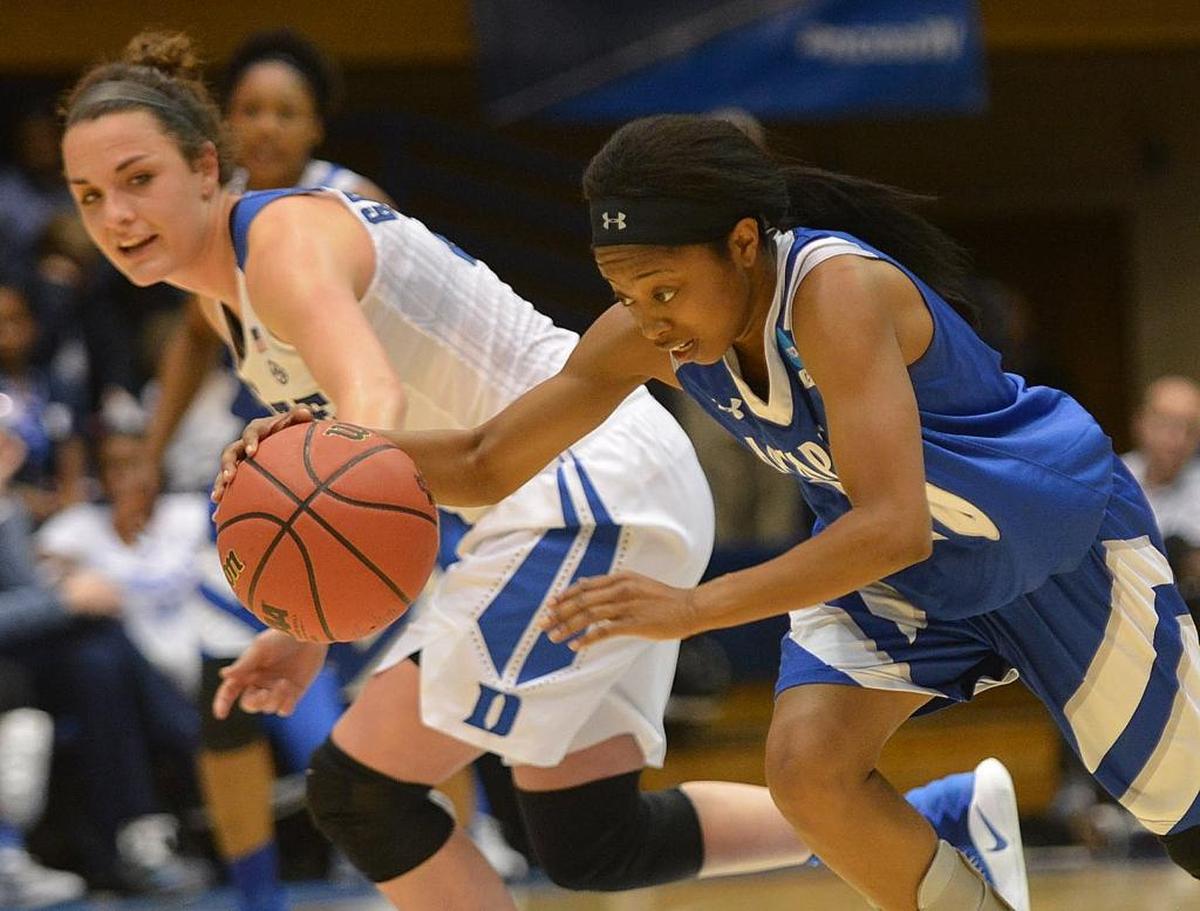 Duke's Rebecca Greenwell goes after a loose ball against Hampton's Georgianna Gilbeaux, during the first round of the NCAA tournament.