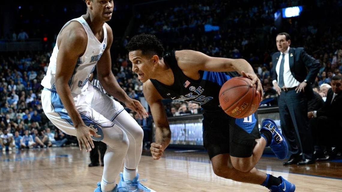 Duke guard Frank Jackson right, has decided to hire an agent and stay in the NBA draft.