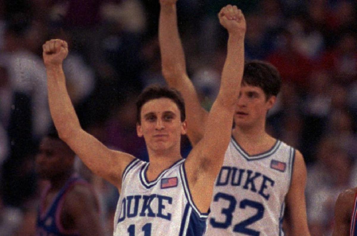 Duke's Bobby Hurley, left, celebrates with teammate Christian Laettner after the Blue Devils beat Kansas 72-65 for the NCAA championship on April 1, 1991.