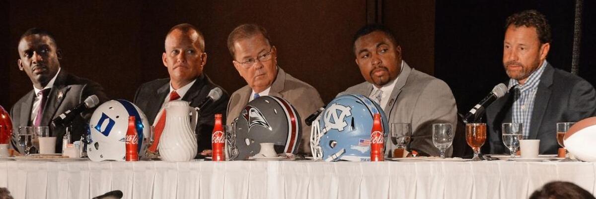 Coaches from the local Division I college football programs spoke at the Bill Dooley Pigskin Preview in July. Featured were, left to right, East Carolina head coach Scottie Montgomery, N.C. State coach Dave Doeren, Duke coach David Cutcliffe, N.C. Central coach Jerry Mack and UNC coach Larry Fedora.
