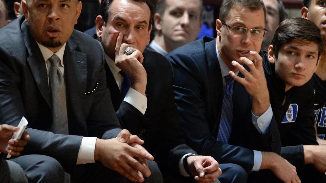 Duke coaches (left to right) Jeff Capel, Mike Krzyzewski and Jon Scheyer sit next to Grayson Allen during a game last season. Allen will be the lone senior on next season’s Duke team, which will get much needed extra practice time because it is taking a foreign tour to the Dominican Republic in August.