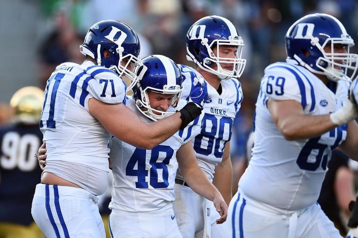 Duke’s AJ Reed (48) is congratulated by teammates after kicking the game winning field goal against the Notre Dame in September.
