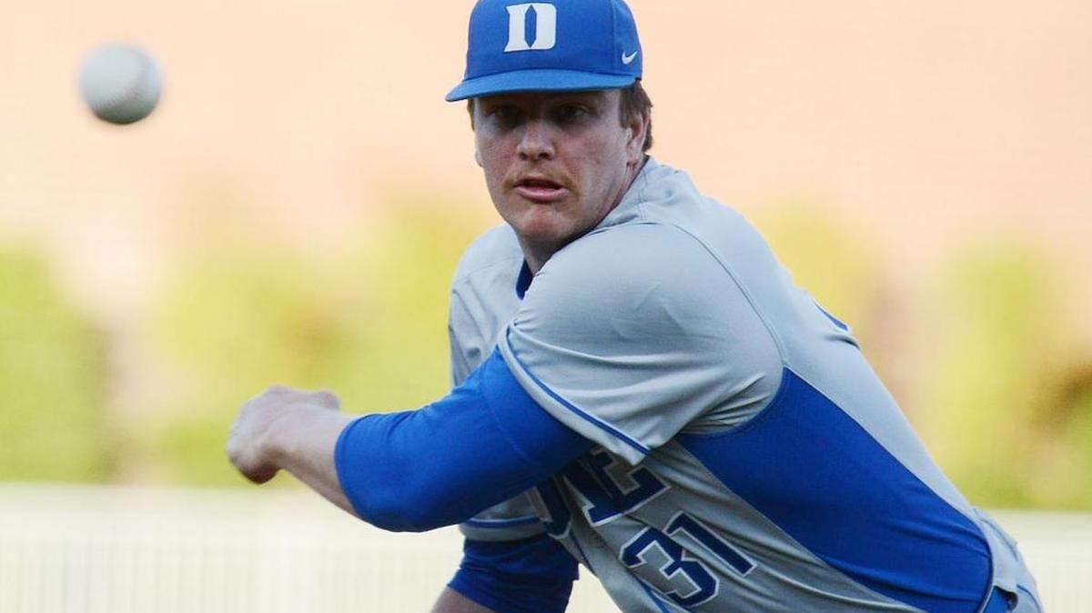 Duke pitcher Graeme Stinson delivers against the Durham Bulls at the Durham Bulls Athletic Park in an exhibition game on Tuesday night.