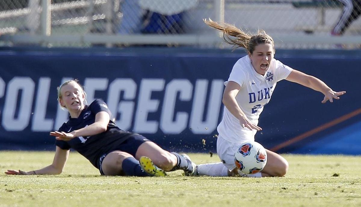 Penn State's Haleigh Echard (15) battles Duke's Morgan Reid (24) for the ball during the second half of the NCAA Women's College Cup Soccer Finals held at WakeMed Soccer Park in Cary, NC on Dec. 6, 2015. Penn State beat Duke 1-0 to win the national championship.