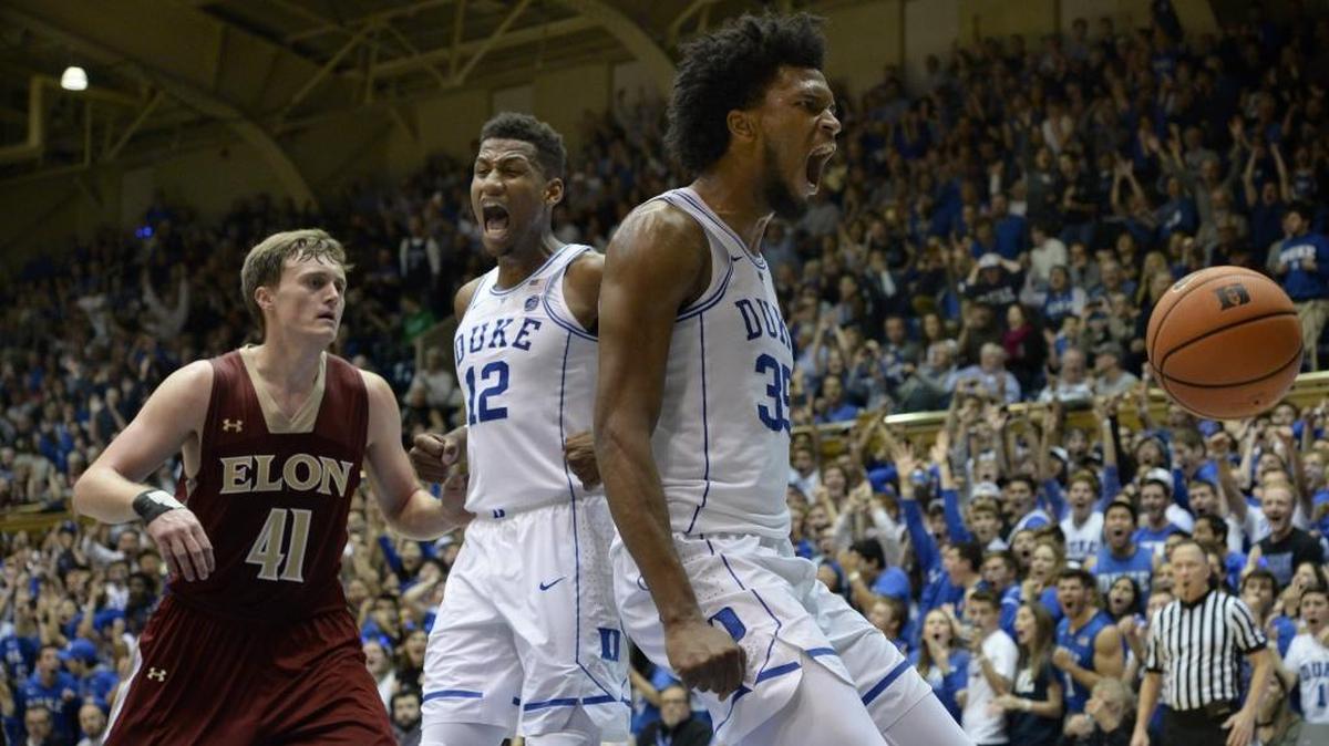 Duke forward Marvin Bagley III (35) and teammate forward Javin DeLaurier (12) react after a massive first half dunk over Elon forward Tyler Seibring (41). Duke played Elon in their season opener at Cameron Indoor Stadium in Durham, N.C. Friday, Nov. 10, 2017.