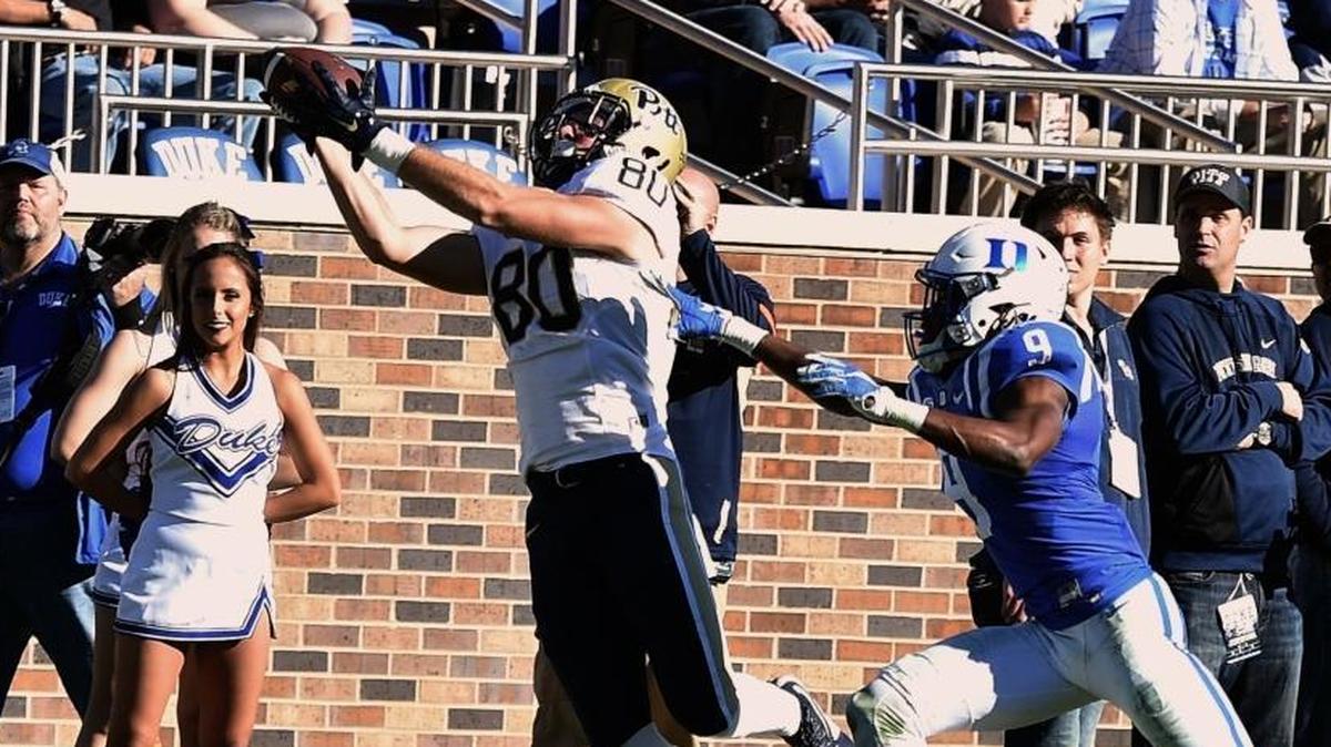 Zach Challingsworth (80) of the Pittsburgh Panthers catches a pass against Jeremy McDuffie (9) of the Duke Blue Devils at Wallace Wade Stadium on November 14, 2015 in Durham, North Carolina. Pittsburgh defeated Duke 31-13.