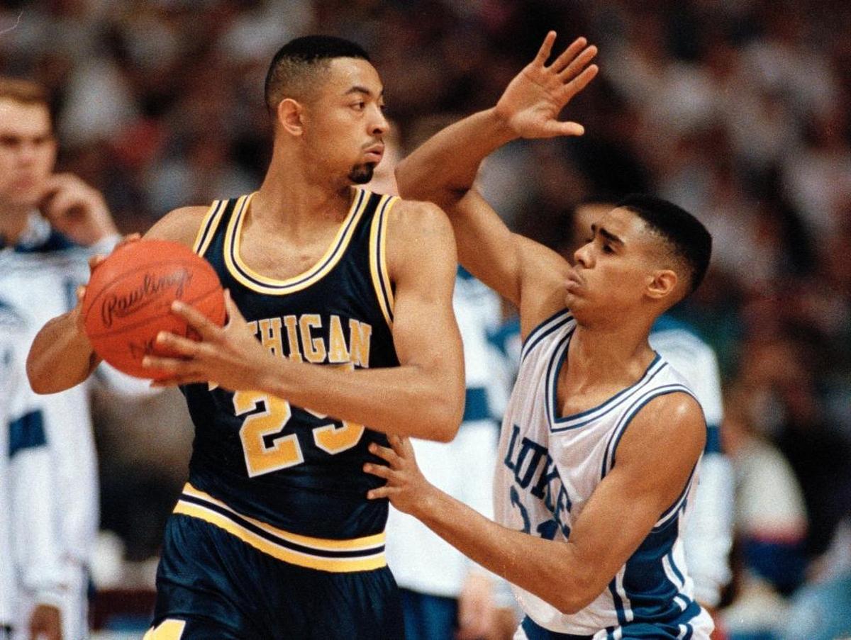 Duke’s Antonio Lang, right, pressures Michigan’s Juwan Howard during the April 6, 1992, championship game.