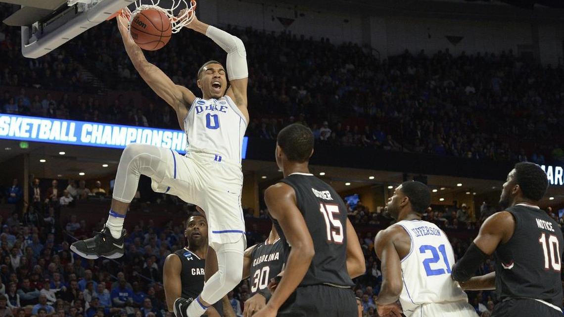 Duke forward Jayson Tatum (0) goes in for a first half dunk over the Gamecocks. South Carolina upset the Blue Devils 88-81at the Second Round of the NCAA tournament Sunday, March 19, 2017, at the Bon Secours Wellness Arena in Greenville, S.C.