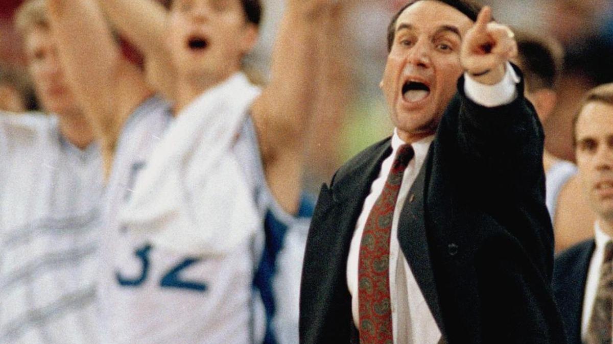 Duke coach Mike Krzyzewski directs his team as Christian Laettner cheers during the 1991 NCAA championship game against Kansas.