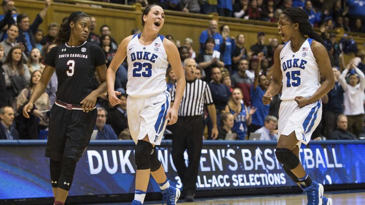 Duke's Rebecca Greenwell (23) and Kyra Lambert (15) celebrate in the final seconds of an NCAA college basketball game against South Carolina in Durham, N.C., Sunday, Dec. 4, 2016. Duke beat South Carolina 74-63.