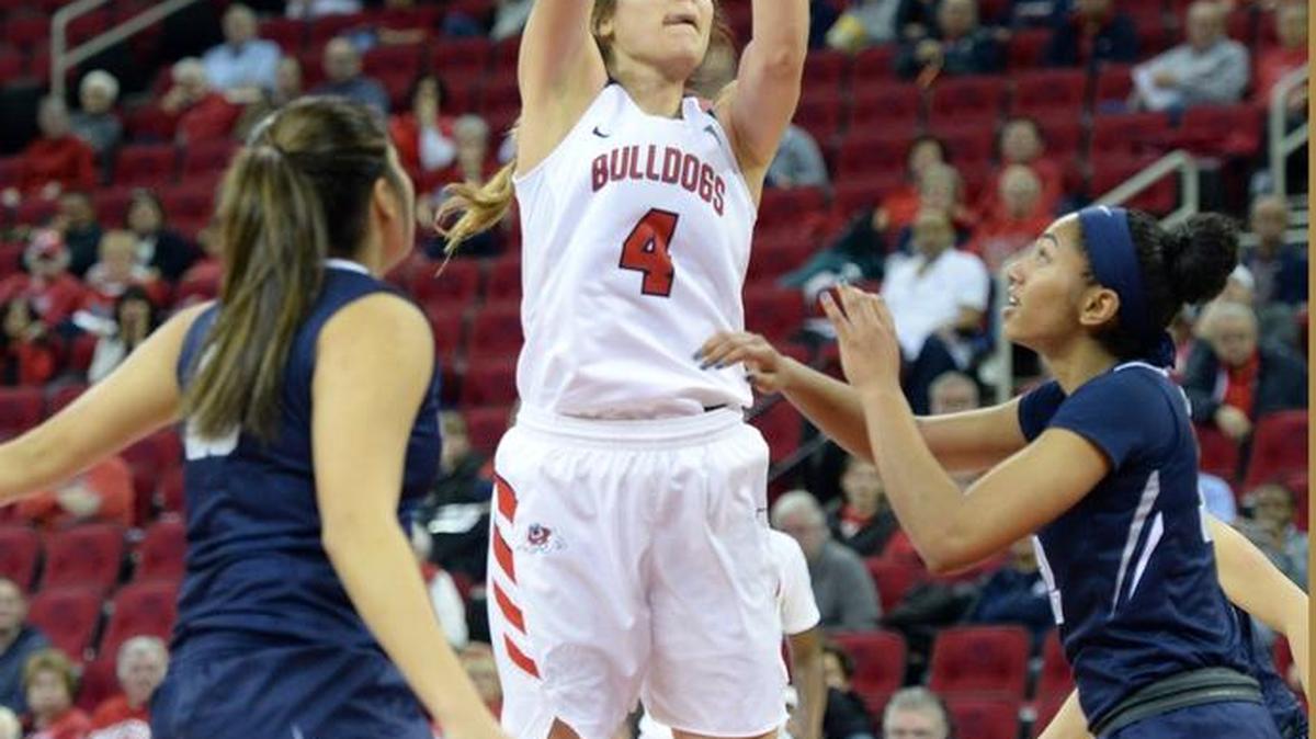 Fresno State's Bego Faz Davalos, center, takes a jump shot against Nevada last Jan. 21. The 6-3 Davalos will transfer to Duke to play her final season with the Blue Devils next season.