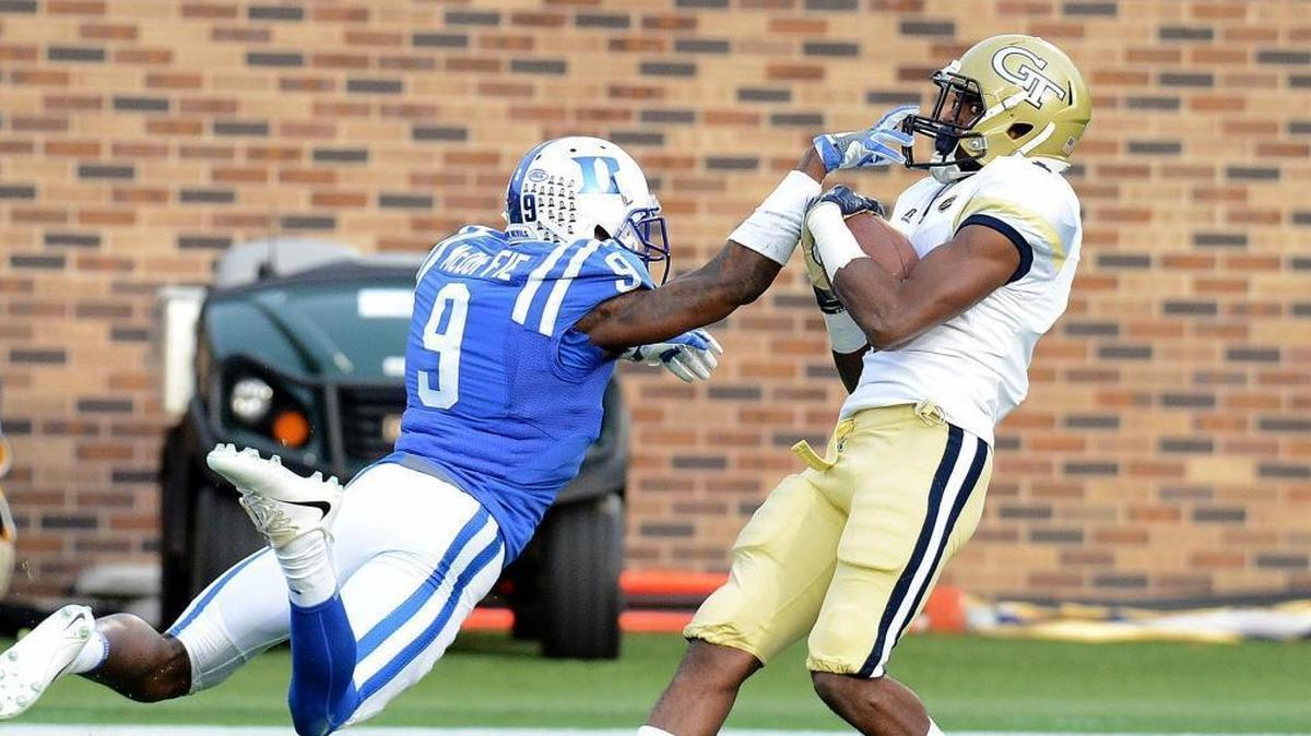 Duke’s Jeremy McDuffie, left, goes after Georgia Tech’s Qua Searcy on Saturday.