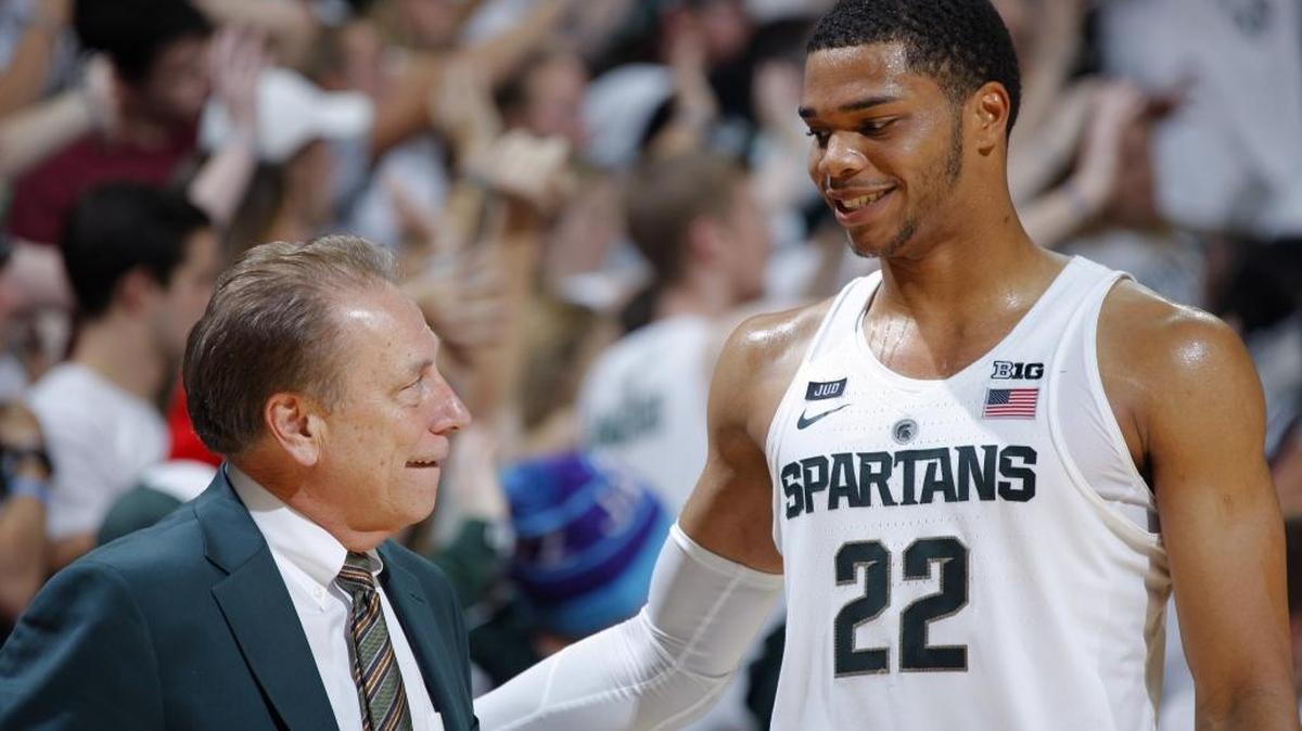 Michigan State coach Tom Izzo, left, and Miles Bridges talk during the Spartans’ game against North Florida on Friday.
