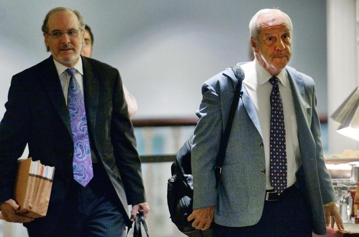 North Carolina basketball coach Roy Williams and his lawyer Jim Cooney, left, arrive at an NCAA hearing Wednesday, Aug. 16, 2017, in Nashville.