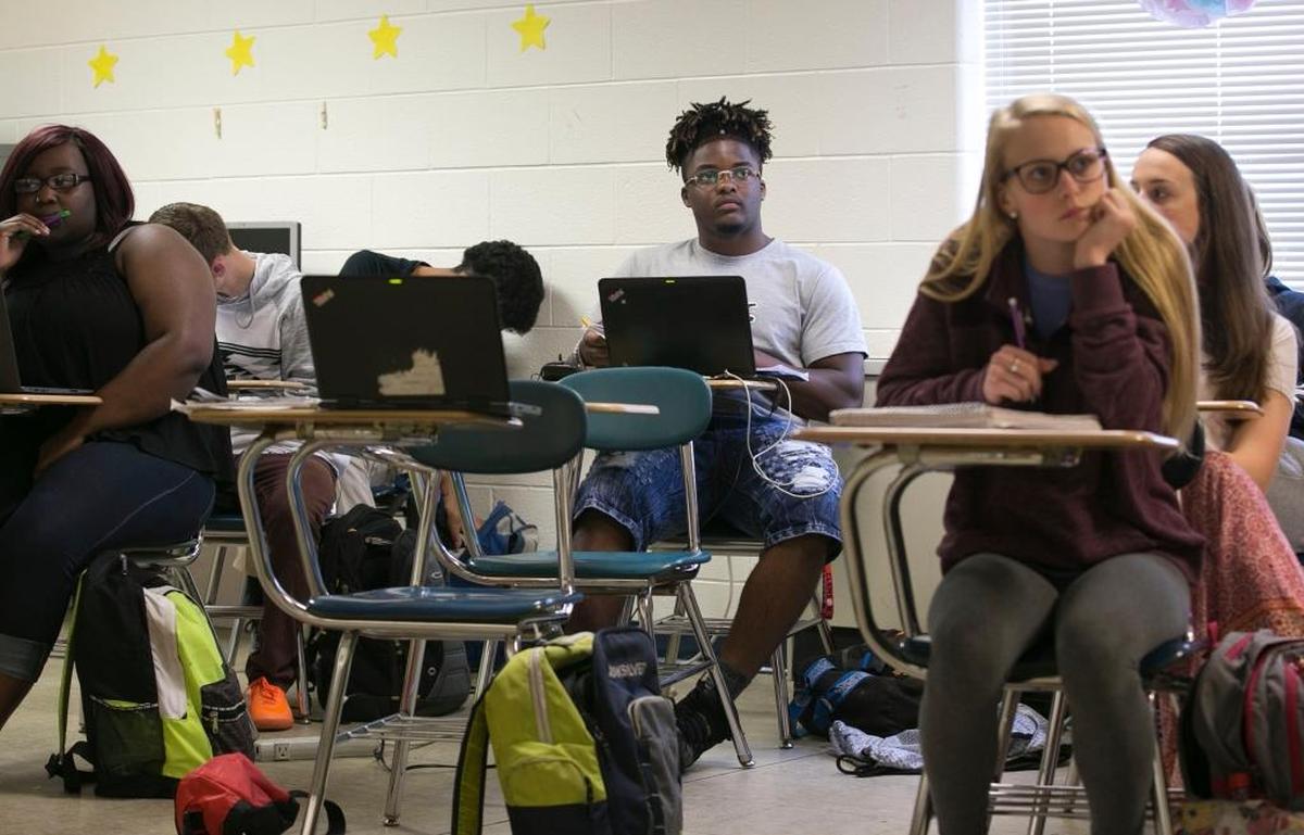 Jahmir Smith listens to Spanish teacher, Julissa Rivera during class at Lee County High School in May. Smith has accepted a scholarship to Notre Dame.