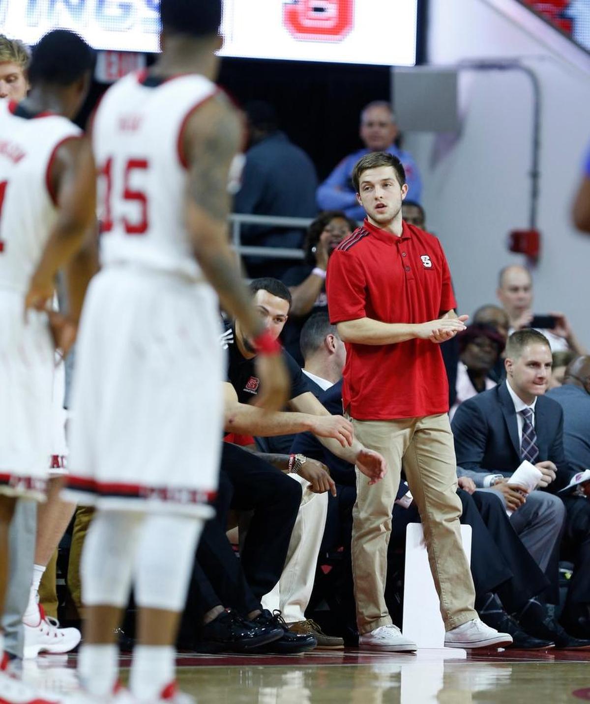 N.C. State's Braxton Beverly watches from the bench during the Wolfpack's exhibition game against Mars Hill University at PNC Arena Friday, Nov. 3, 2017.