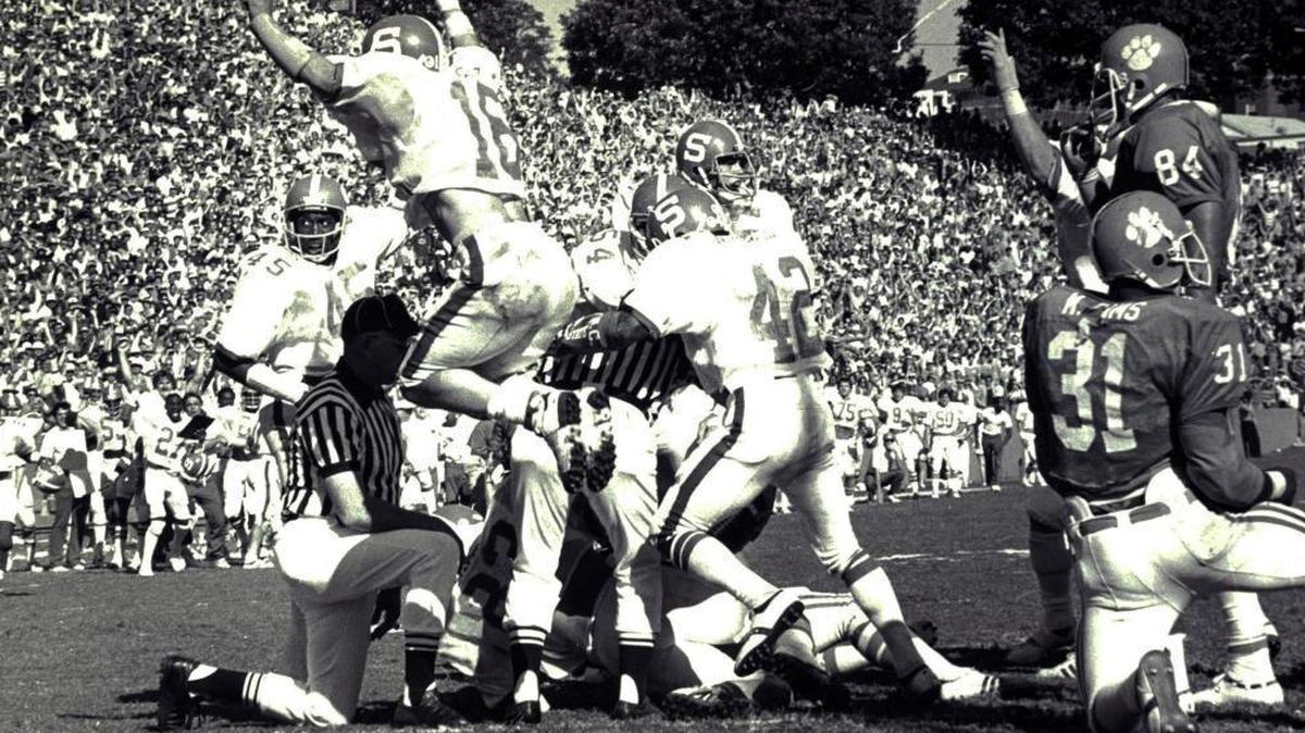 N.C. State’s Mike Nall celebrates as the Wolfpack makes a goal-line stand against Clemson in 1979.