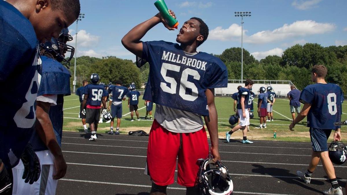 Defensive lineman Joseph Boletepeli takes a break during practice in 2015. He committed to N.C. State on Sunday.