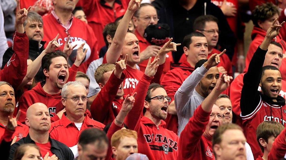 N.C. State fans cheer on their team in 2015. Four-star player Immanuel Bates will decide between the Wolfpack and Georgetown on Friday.