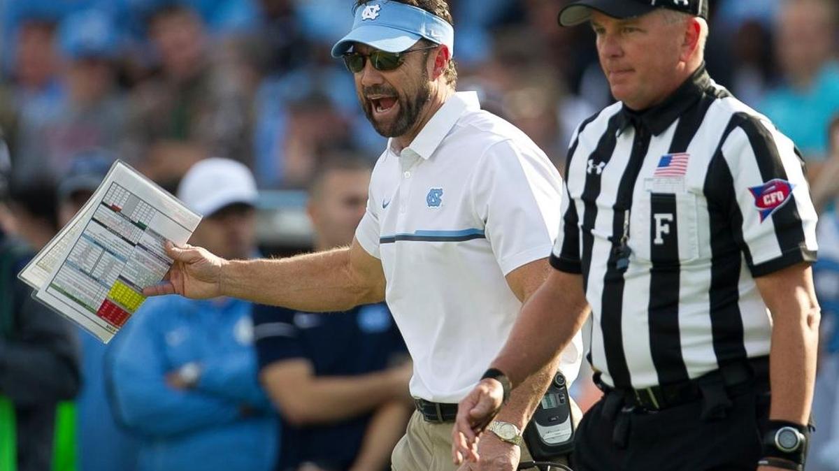 North Carolina coach Larry Fedora argues with an official during a game against N.C. State in November.