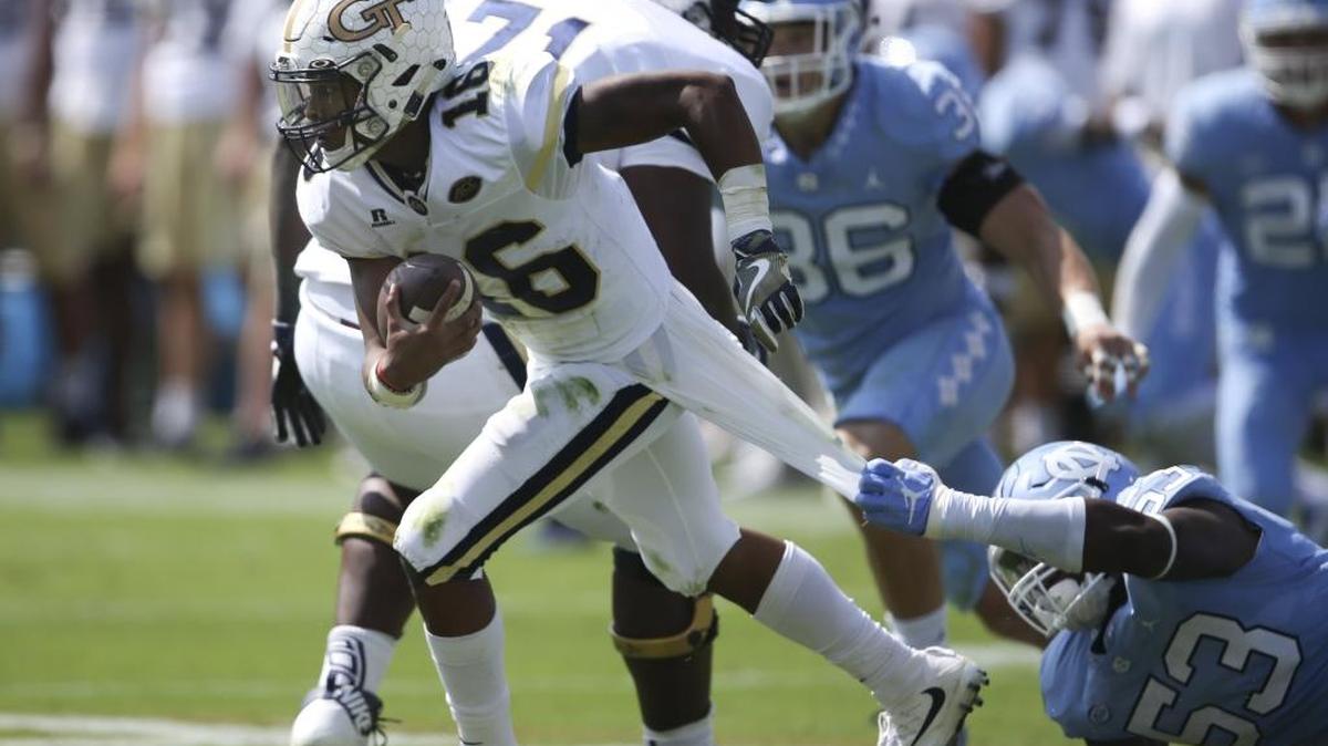 Georgia Tech quarterback TaQuon Marshall (16) breaks free from North Carolina defensive end Malik Carney (53) in the first half of an NCAA college football game Saturday, Sept. 30, 2017, in Atlanta. (AP Photo/John Bazemore)
