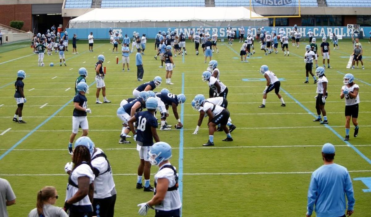 Players fill the field at Kenan Stadium on the opening day of UNC football.