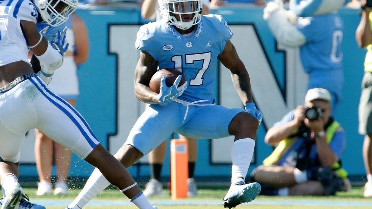 UNC’s Anthony Ratliff-Williams runs the ball upfield during the Tar Heels’ game against Duke on Saturday. UNC plays at Georgia Tech this weekend.